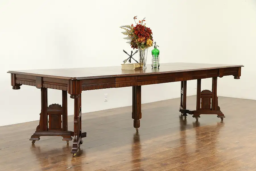 Main image of Victorian Eastlake Antique Walnut Dining Table, 6 Leaves, Extends 115"