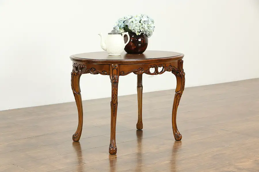 Main image of Oval Vintage Carved Walnut Coffee Table, Marquetry Top