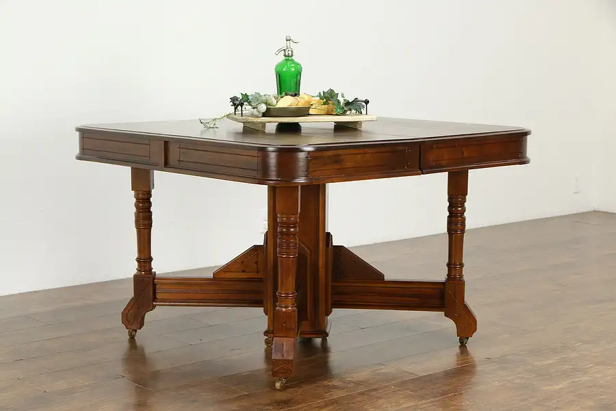 Main image of Victorian Eastlake Antique Walnut 46" Dining Table, 11 Leaves Extends 15'