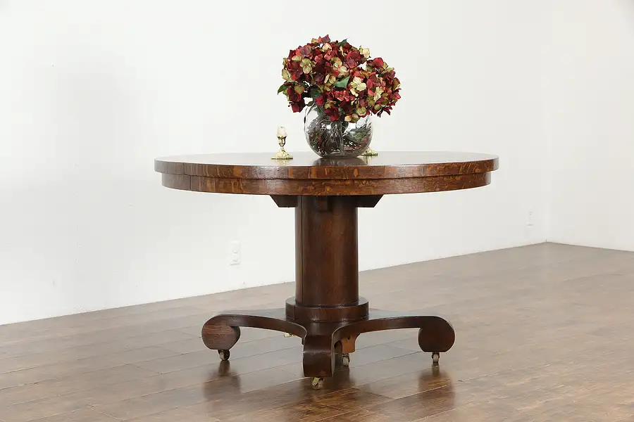 Main image of Oak 4' Round Antique Pedestal Dining Table, 6 Leaves, Extends 10'