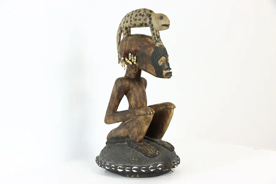 Main image of African Carved Antique Wooden Sculpture, Seated Man Statue Shells & Beads