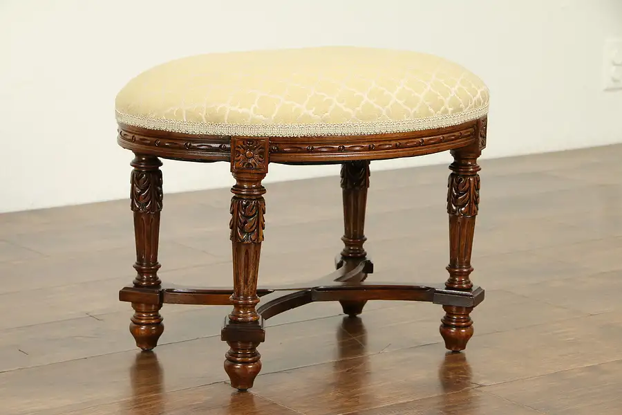 Main image of French Style Oval Carved Walnut Antique Footstool or Bench