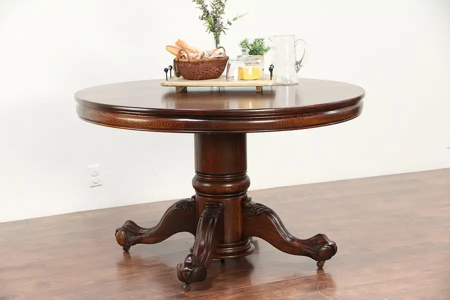 Main image of Oak Round 48" Antique Dining Table, Eagle Talon Pedestal, Extends 10'