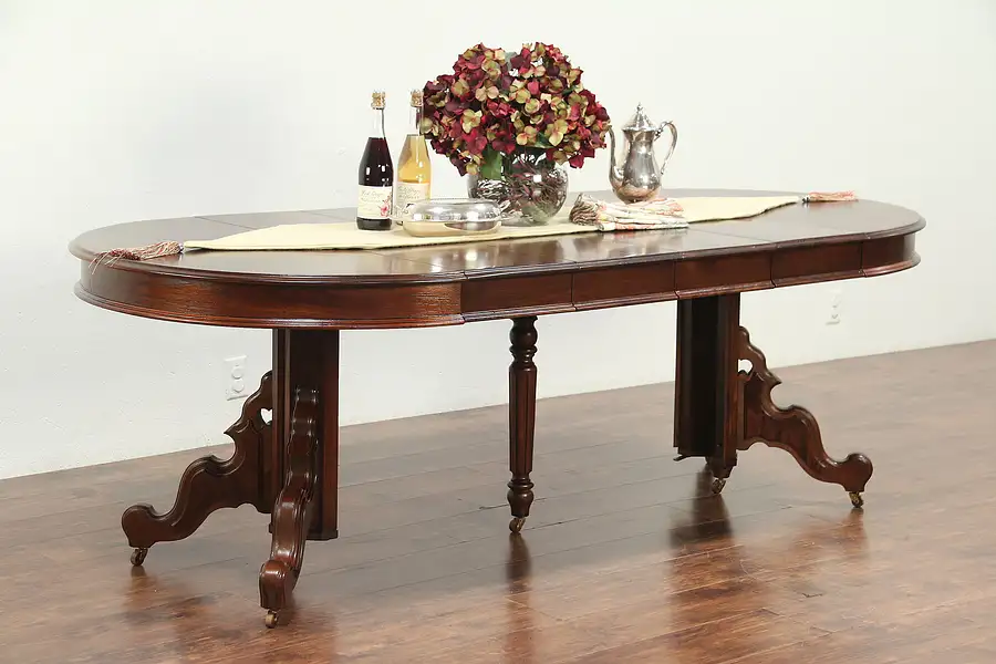 Main image of Victorian Antique Round Walnut Dining Table, 4 Leaves, Extends 7' 5"