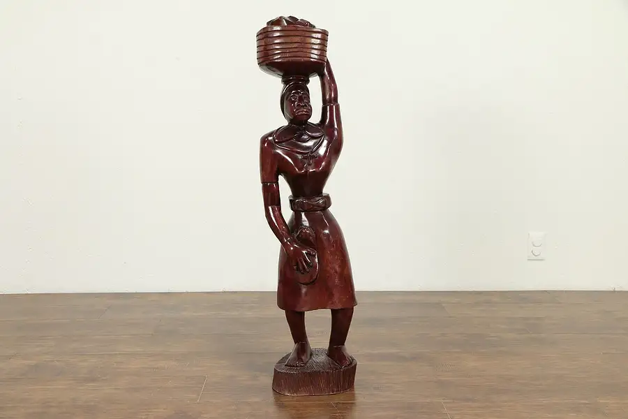 Main image of Statue of Woman Carrying a Basket, Haiti 1962, John Gaule, 39" Sculpture