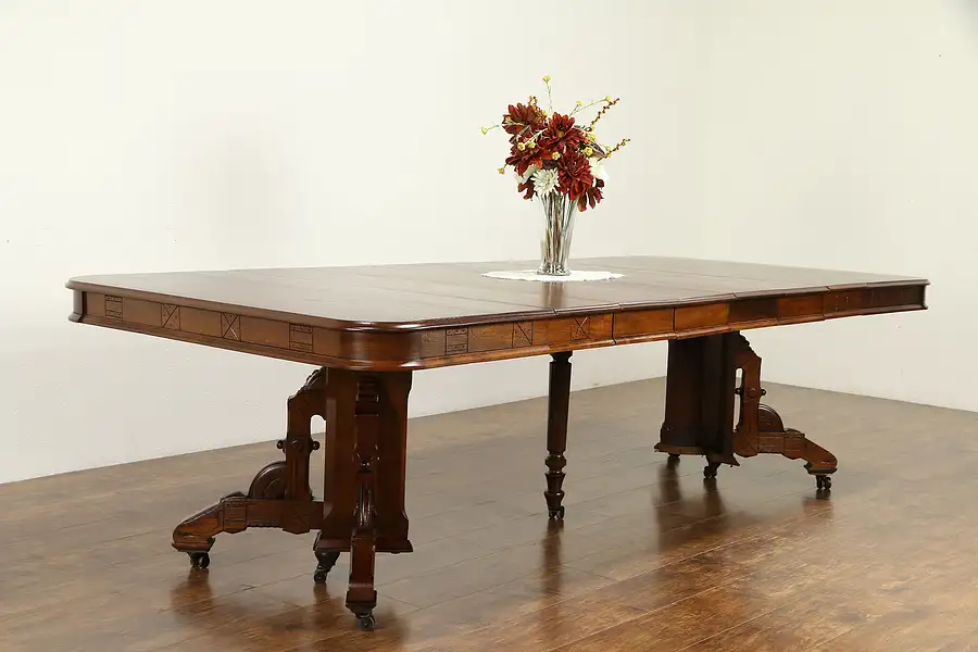 Main image of Victorian Eastlake Antique Walnut Dining Table, 6 Leaves, 110" Long