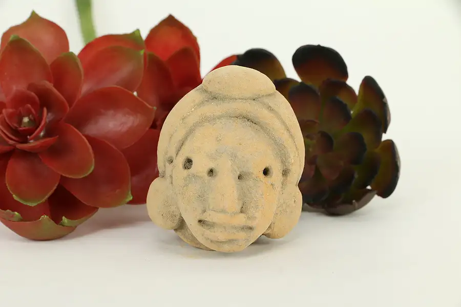 Main image of This miniature terracotta or red clay head is in the Pre-Columbian Mayan