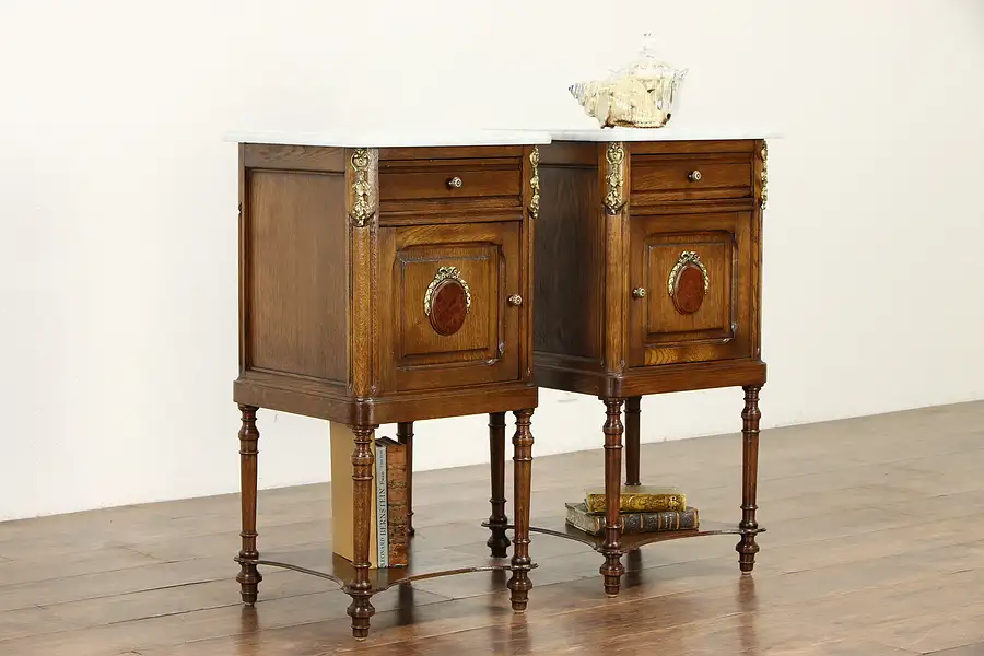 Main image of Pair of Antique Carved Oak French Nightstands, Brass Mounts, Marble Tops