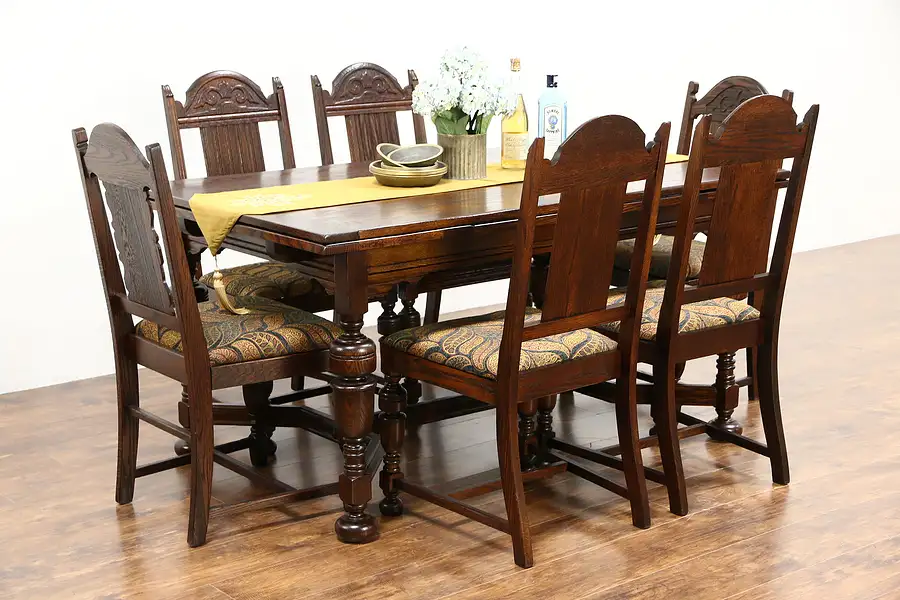 Main image of English Tudor Antique 1920 Oak Dining Set, Table 2 Leaves, 6 Chairs