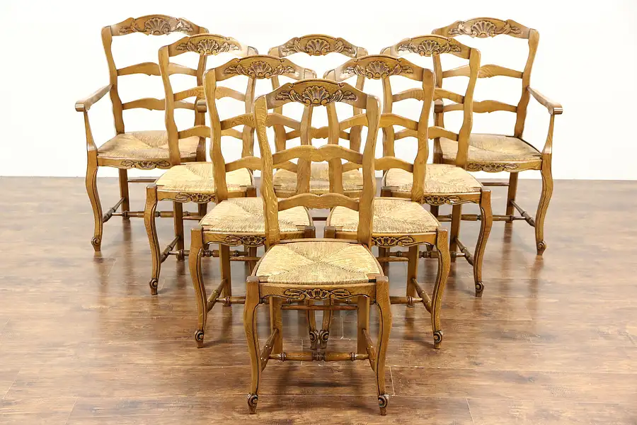 Main image of Set of 8 Country French Carved Oak Antique Dining Chairs, Rush Seats