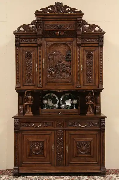 Main image of French Carved Oak Jester Antique Court Cupboard