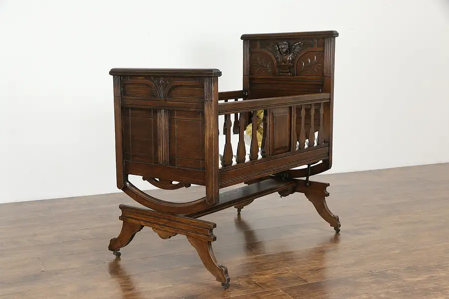 Main image of Victorian Antique Oak Baby Cradle, Crib or Bed, Carved Angel or Cherub