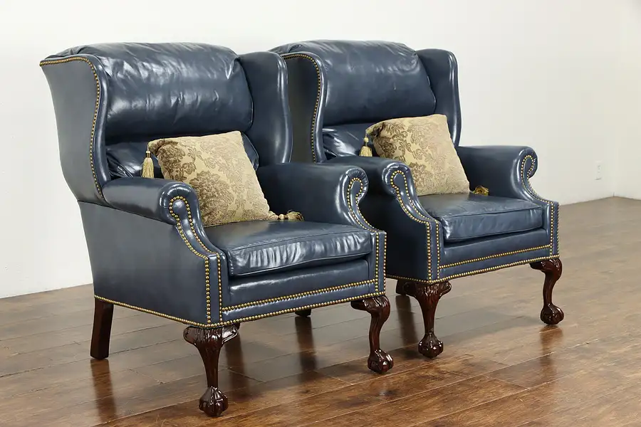 Main image of Pair of Leather Vintage Carved Claw & Ball Wing Chairs, Hancock & Moore