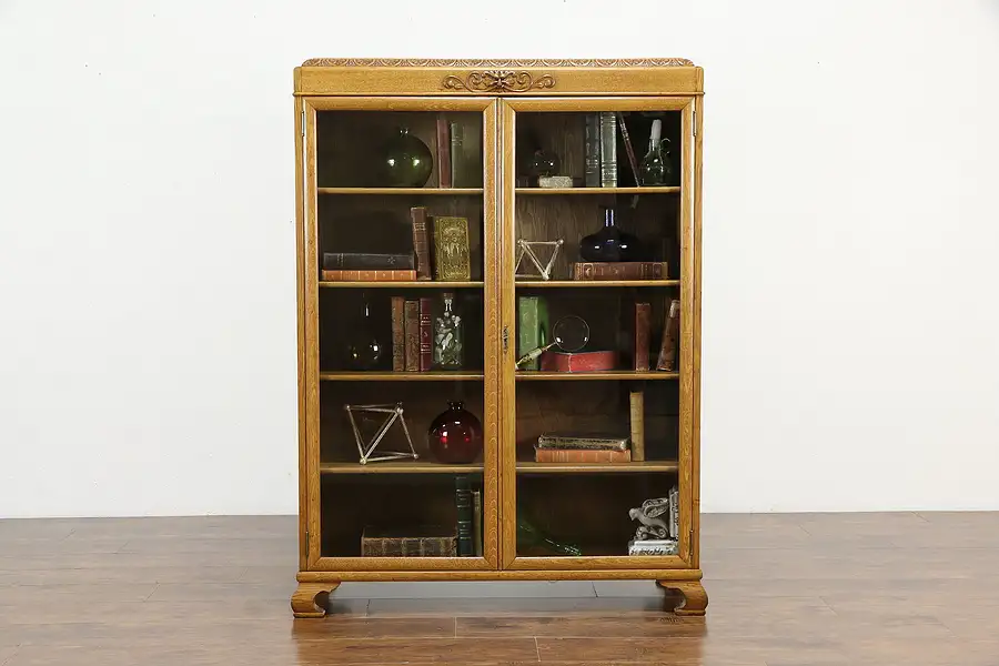 Main image of Oak Antique Office Bookcase, Carved Lion Head, Wavy Glass Doors