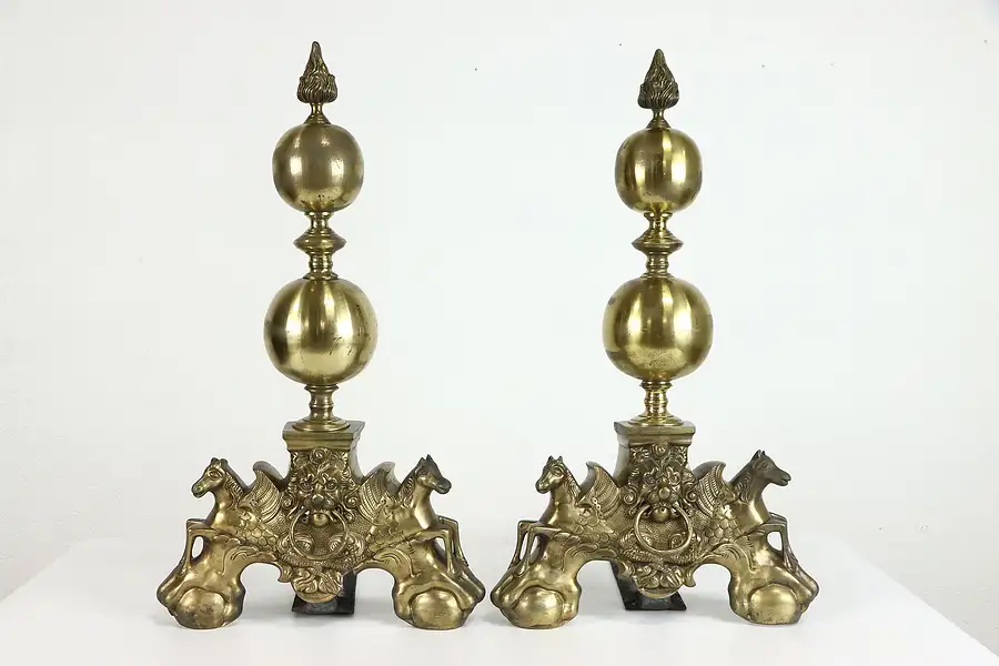 Main image of Pair of Antique Brass Andirons, Flame Finials, Lion and Pegasus Motifs