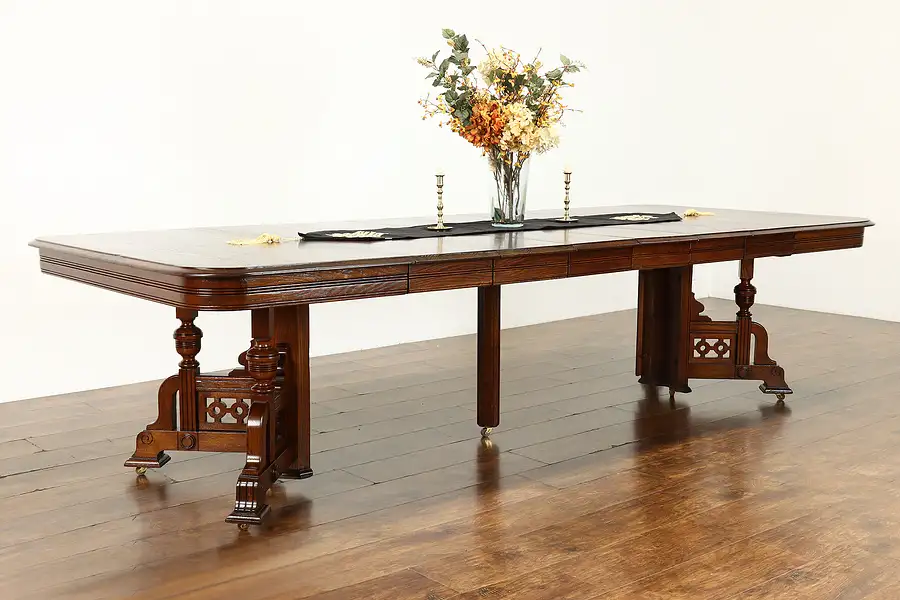 Main image of Victorian Eastlake Oak Antique 4' Dining Table, 6 Leaves Extends 9.5'