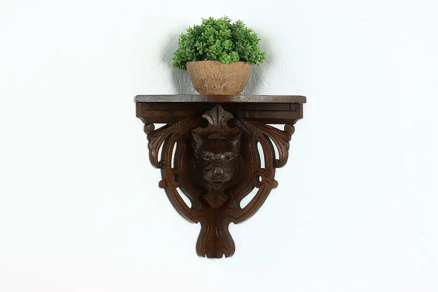 Main image of Black Forest Antique Walnut Corner Wall Shelf, Carved Wildcat Sculpture