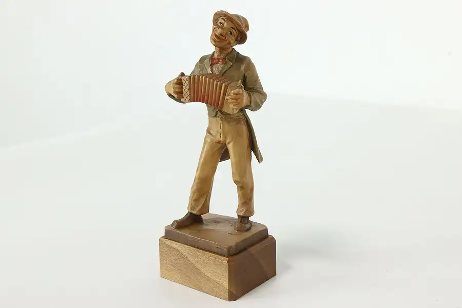 Main image of Swiss Hand Carved Vintage Folk Art Statue, Accordion Player Sculpture