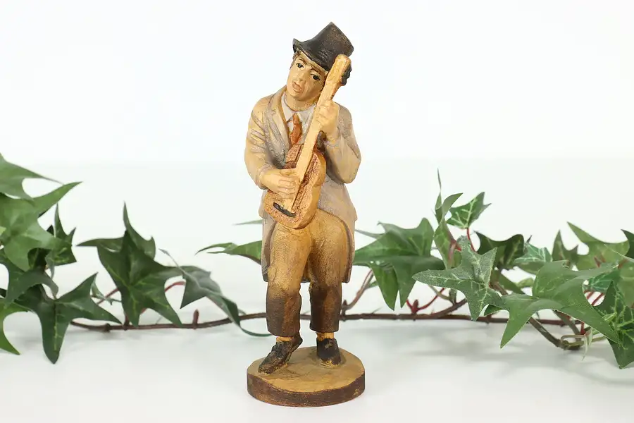 Main image of Man Playing Guitar Hand Carved Vintage Alpine Sculpture