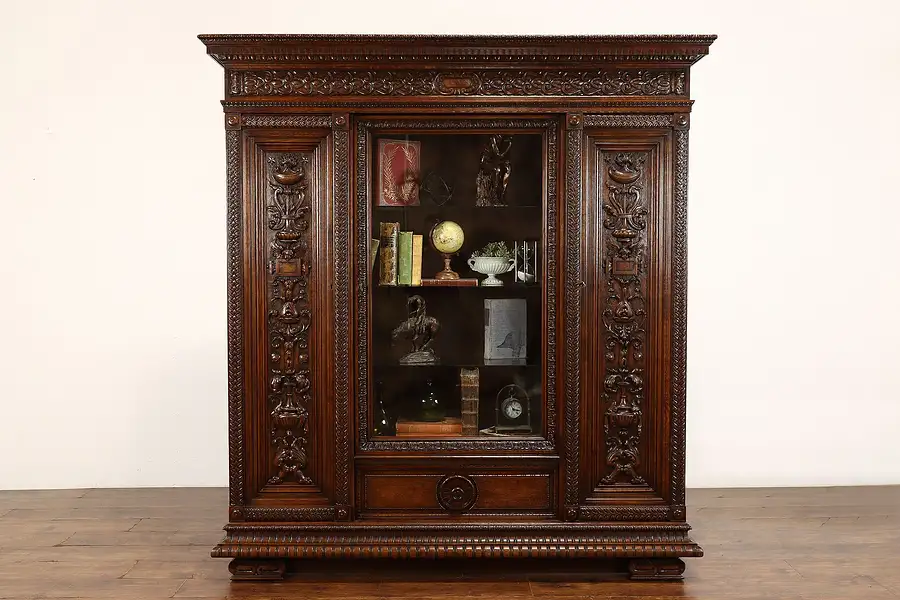 Main image of Renaissance Carved Oak Antique Office or Library Bookcase Display Cabinet