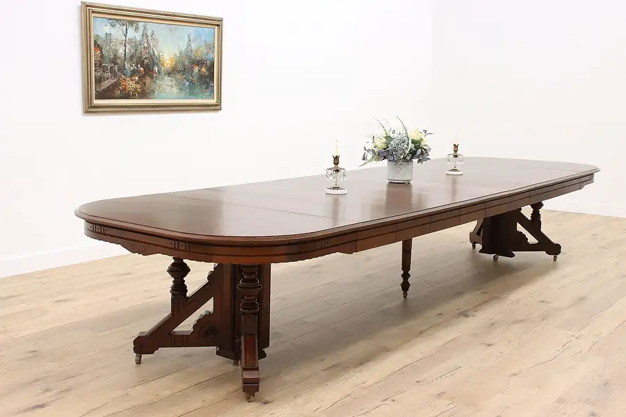 Main image of Victorian Eastlake Antique 54" Walnut Dining Table, 9 Leaves Extends 14'