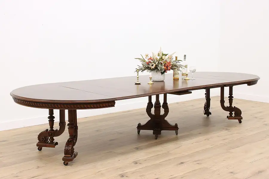 Main image of Austrian Antique Walnut 57" Round Dining Table, Carved Base, Extends 12'