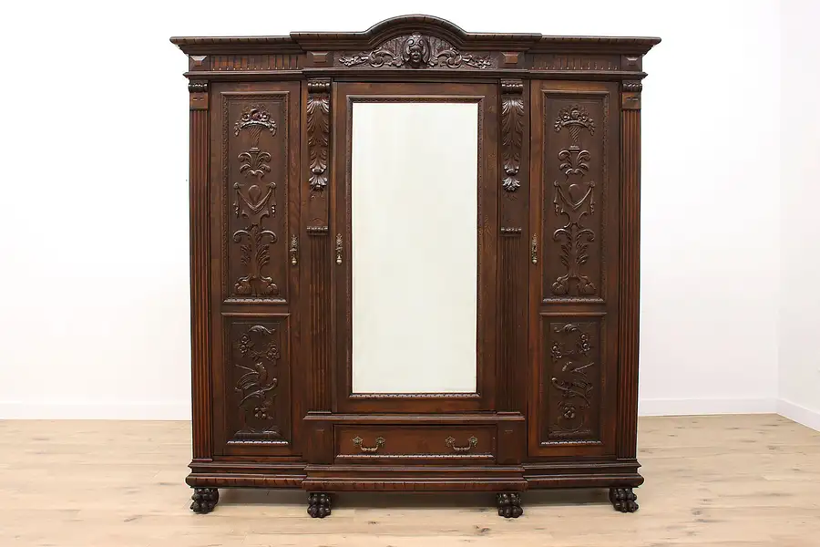 Main image of Italian Renaissance Antique Carved Elm Triple Armoire or Wardrobe, Mirror