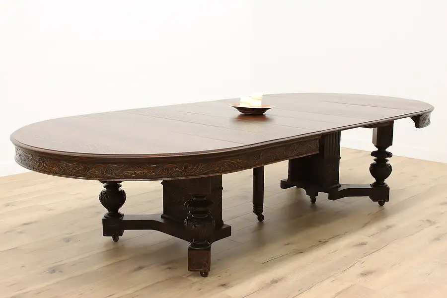 Main image of Tudor Antique Carved Oak 60" Dining Table, 6 Leaves Extends 11'