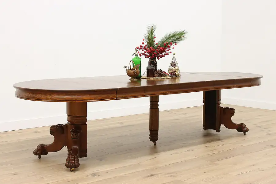 Main image of Victorian Antique Round Oak 48" Dining Table, Extends 10', Lion Pedestal