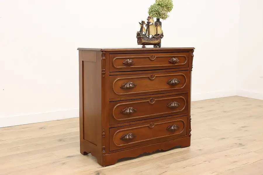 Main image of Victorian Carved Walnut Antique Dresser or Chest, Carved Pulls