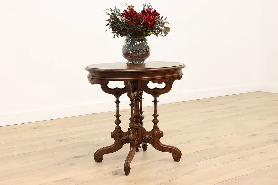 Main image of Victorian Eastlake Antique Carved Walnut Oval Parlor, Hall, Entry Table