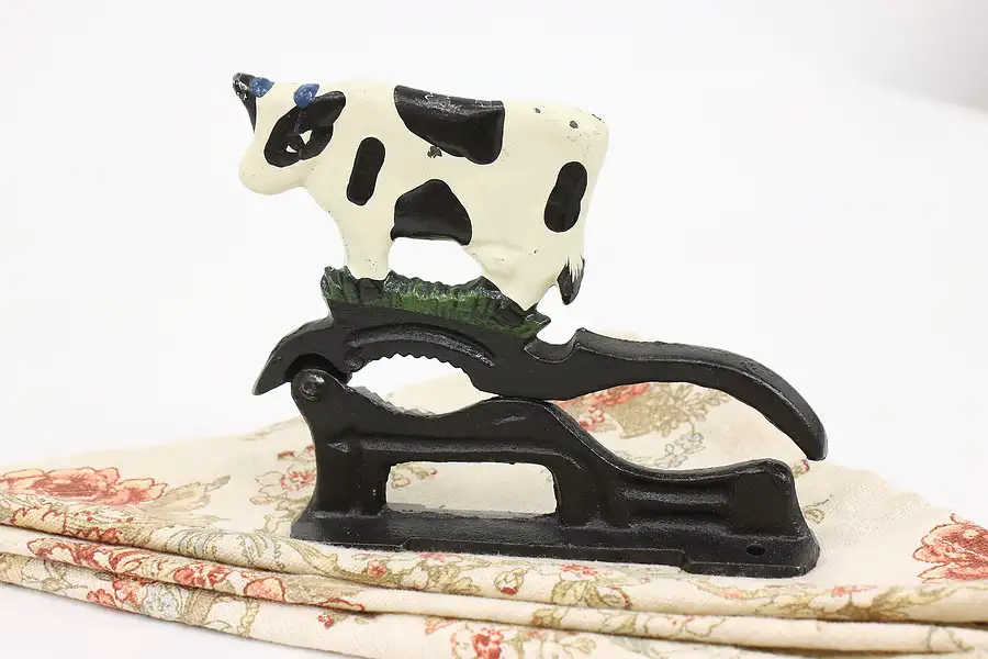 Main image of Farmhouse Antique Cast Iron Painted Cow Nutcracker on Base