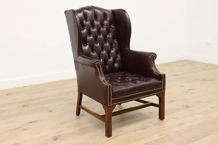 Main image of Tufted Leather Vintage Wingback Chair, Brass Nailhead Trim