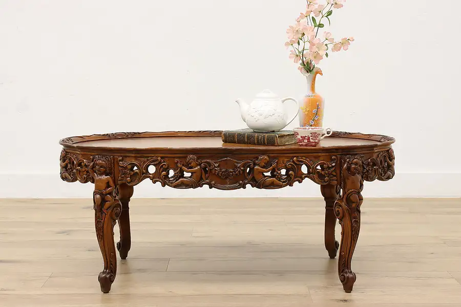 Main image of French Design Vintage Walnut Marquetry Coffee Table Cherubs