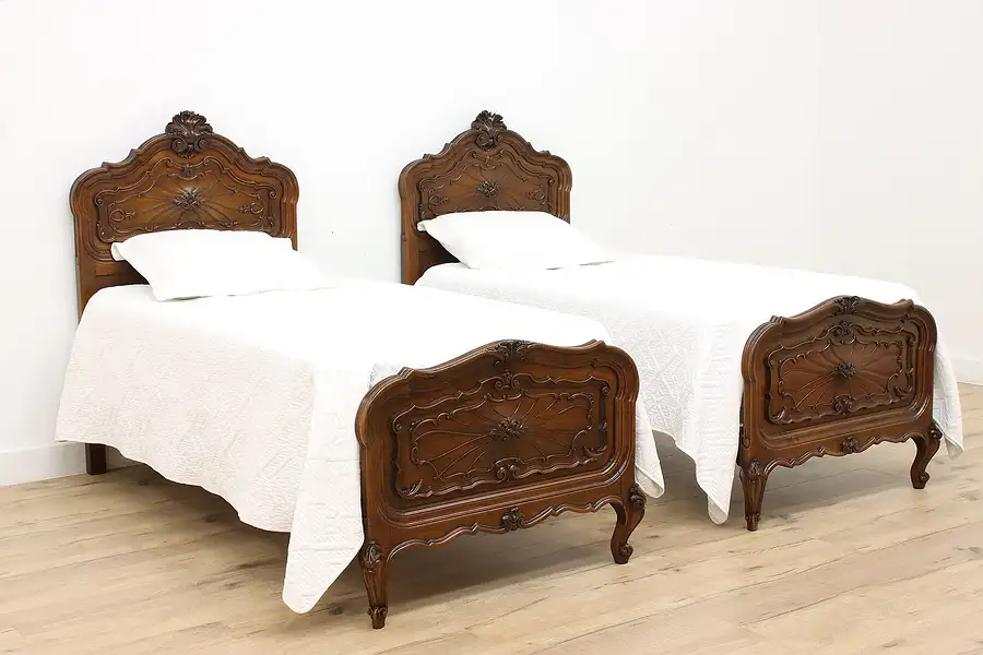 Main image of Pair of Antique Italian Piedmont Carved Walnut Twin Beds