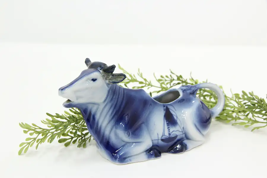 Main image of Farmhouse Antiquie German Flow Blue Porcelain Cow Creamer