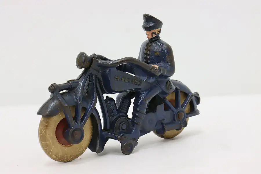 Main image of Painted Cast Iron Vintage Champion Motorcycle Policeman Toy