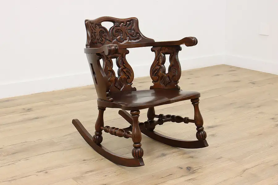 Main image of Tudor Design Carved Oak Antique Rocking Chair