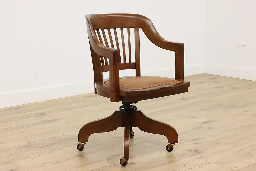 Main image of Gunlocke Antique Oak Swivel & Adjustable Desk Chair