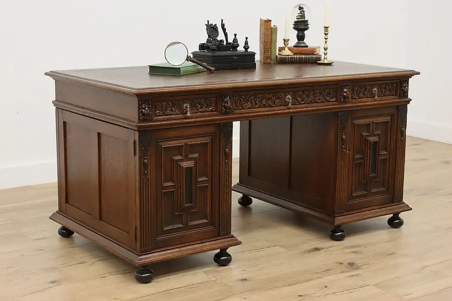 Main image of Renaissance Design Antique Carved Oak Leather Top Desk Lions