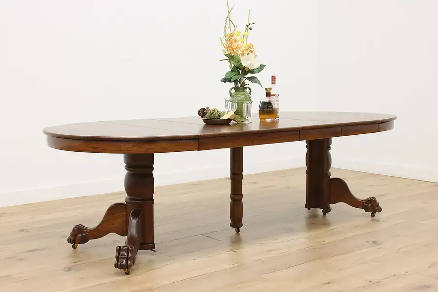 Main image of Victorian Antique Round Oak Dining Table, 4 Leaves, Paw Feet