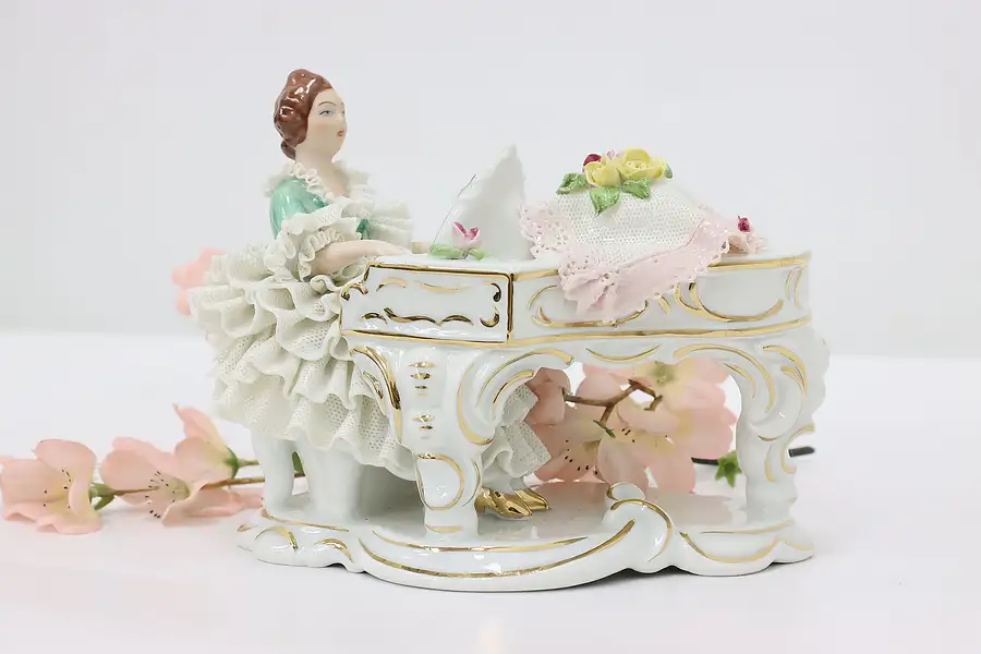 Main image of German Porcelain Antique Woman Playing Piano Figurine