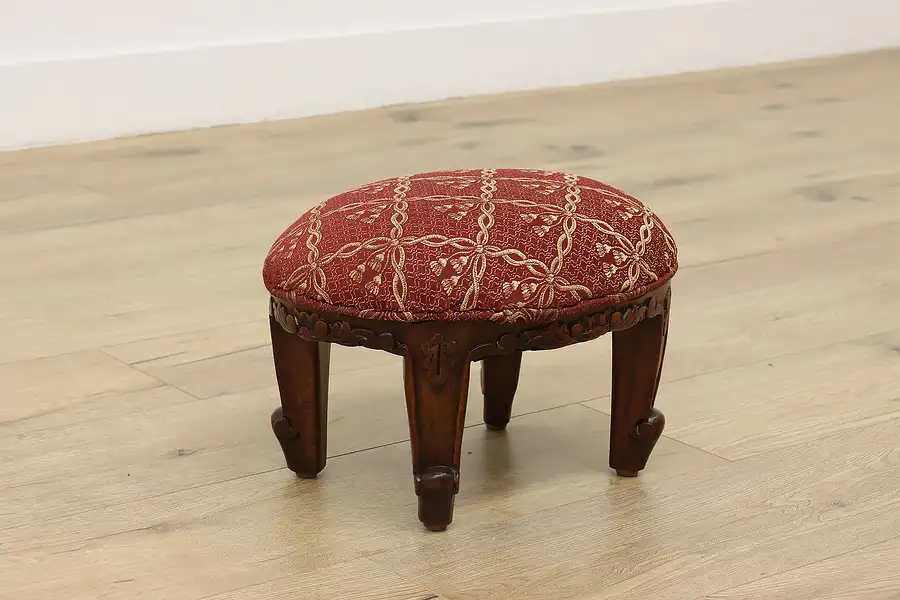 Main image of French Vintage Carved Mahogany Upholstered Oval Footstool