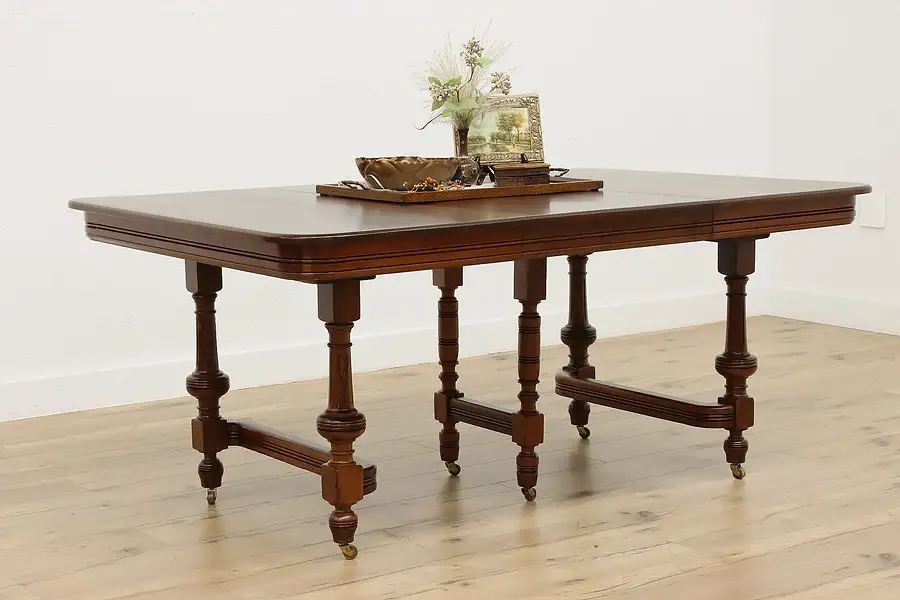 Main image of Victorian Eastlake Antique 11' Walnut Dining Table, 5 Leaves