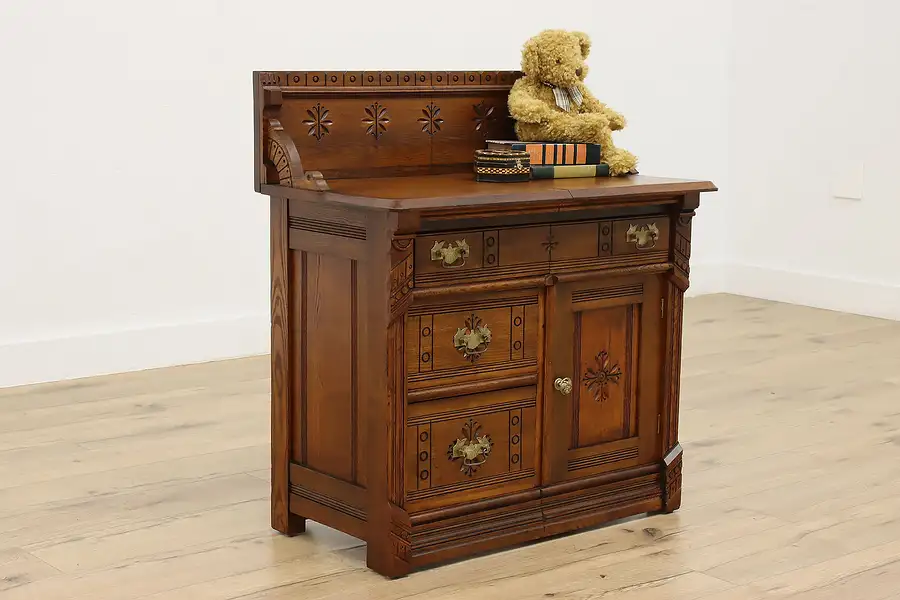 Main image of Victorian Eastlake Antique Spoon Carved Nightstand Chest