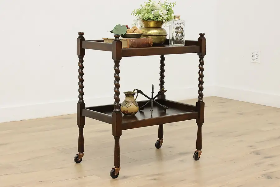 Main image of Tudor Design Antique Oak Barley Twist Rolling Bar Cart