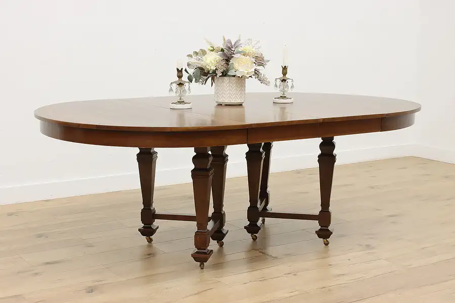 Main image of English Tudor Antique 54" Round Oak Dining Table, 2 Leaves