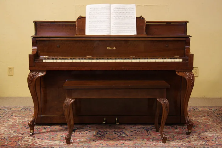 Starck Carved Walnut Spinet Piano & Bench