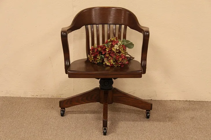 Swivel Antique Oak Armchair