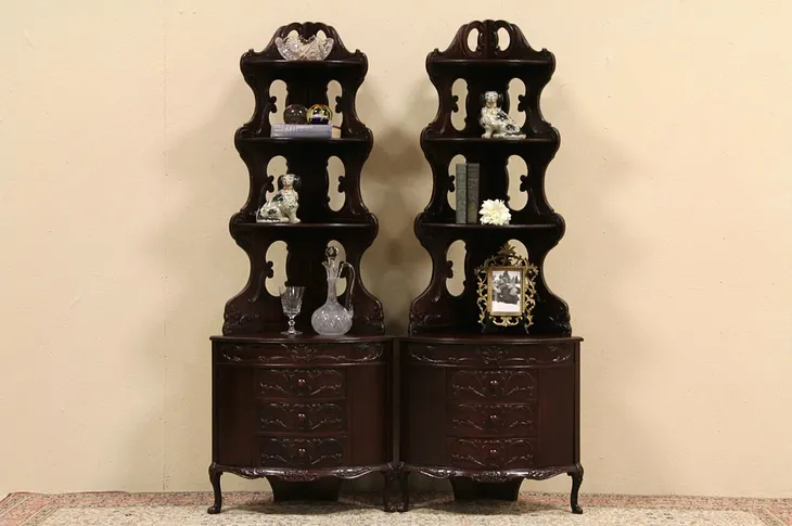 Pair of Carved Corner Cabinets